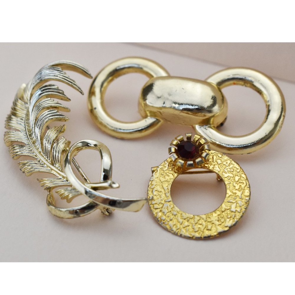 Vintage crystal brooch lot, large fall gold tone jewelry pins